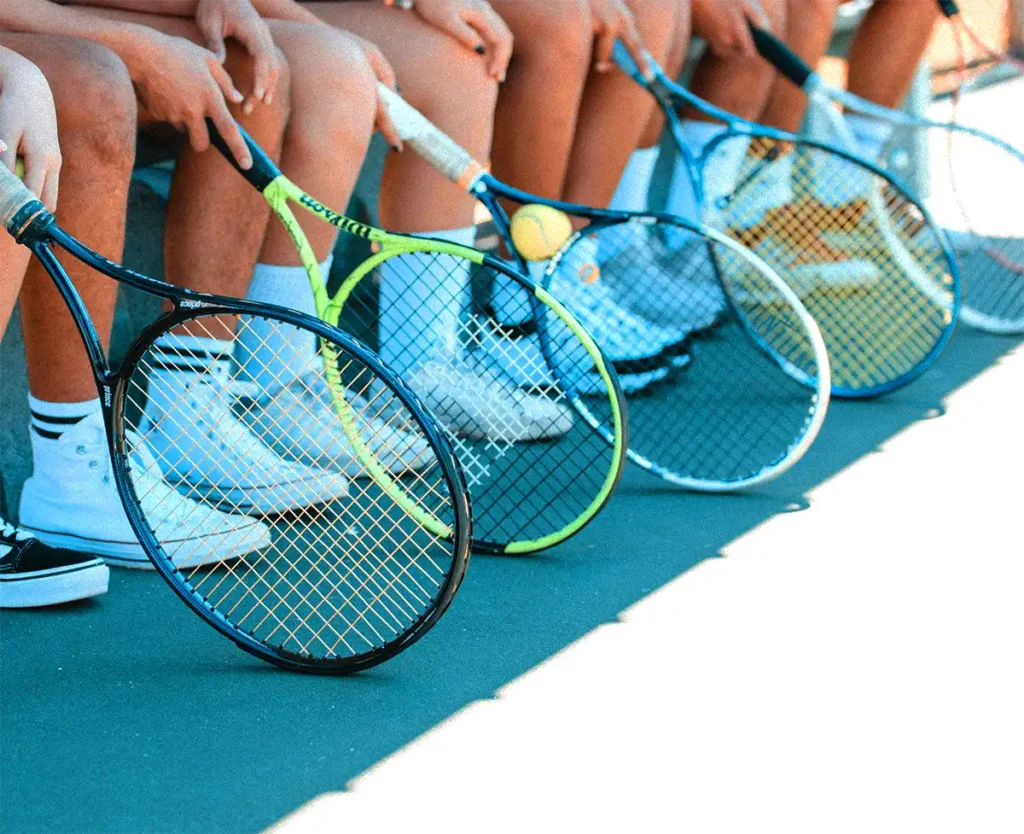 startup accelerator tennis team with rackets ready to play